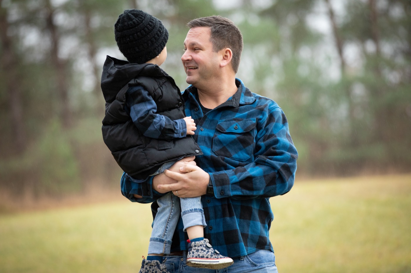 Travis Stoliker with his son